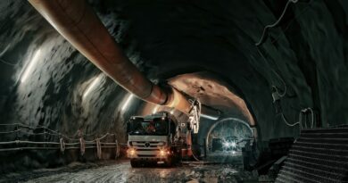 red and black truck in tunnel