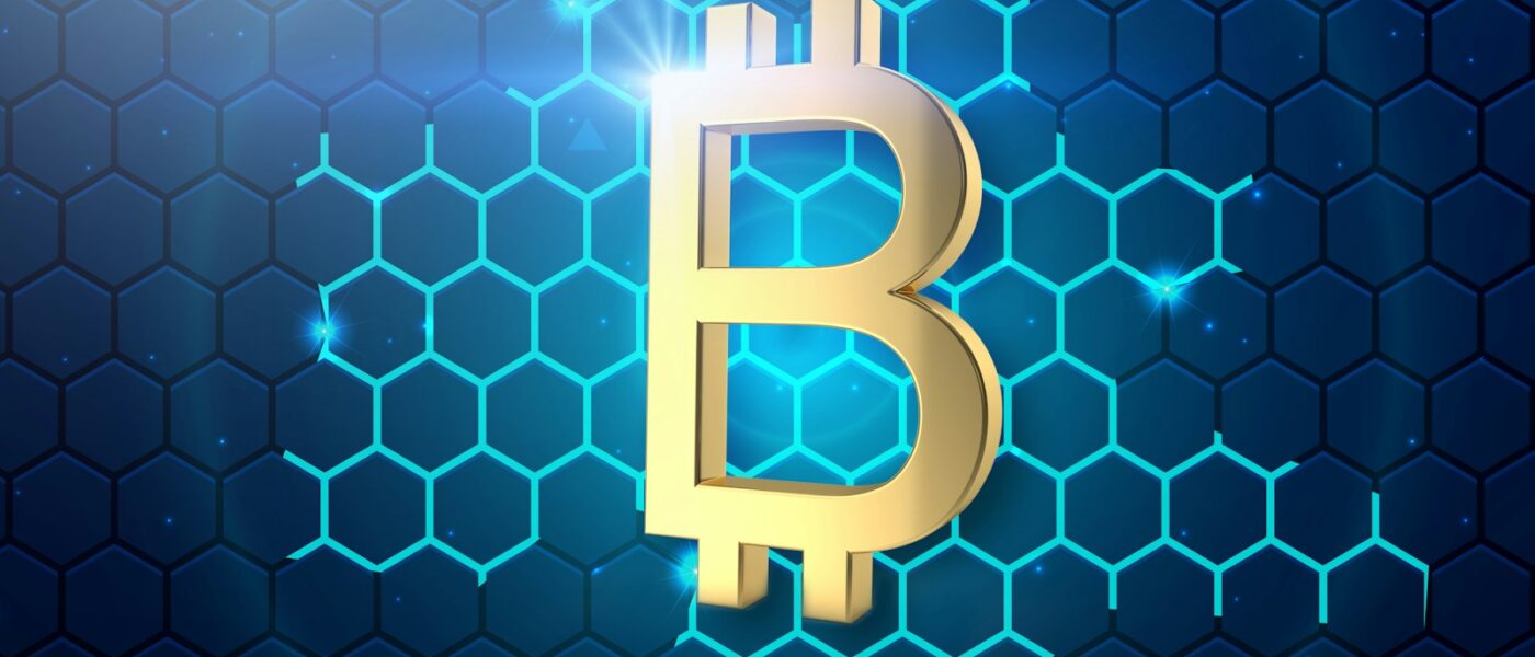 a golden bitcoin on a blue hexagonal background