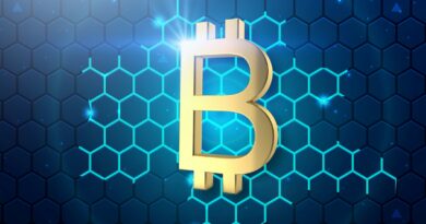 a golden bitcoin on a blue hexagonal background