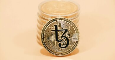 a stack of coins sitting on top of a table