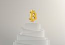 a gold crown on a stack of white paper