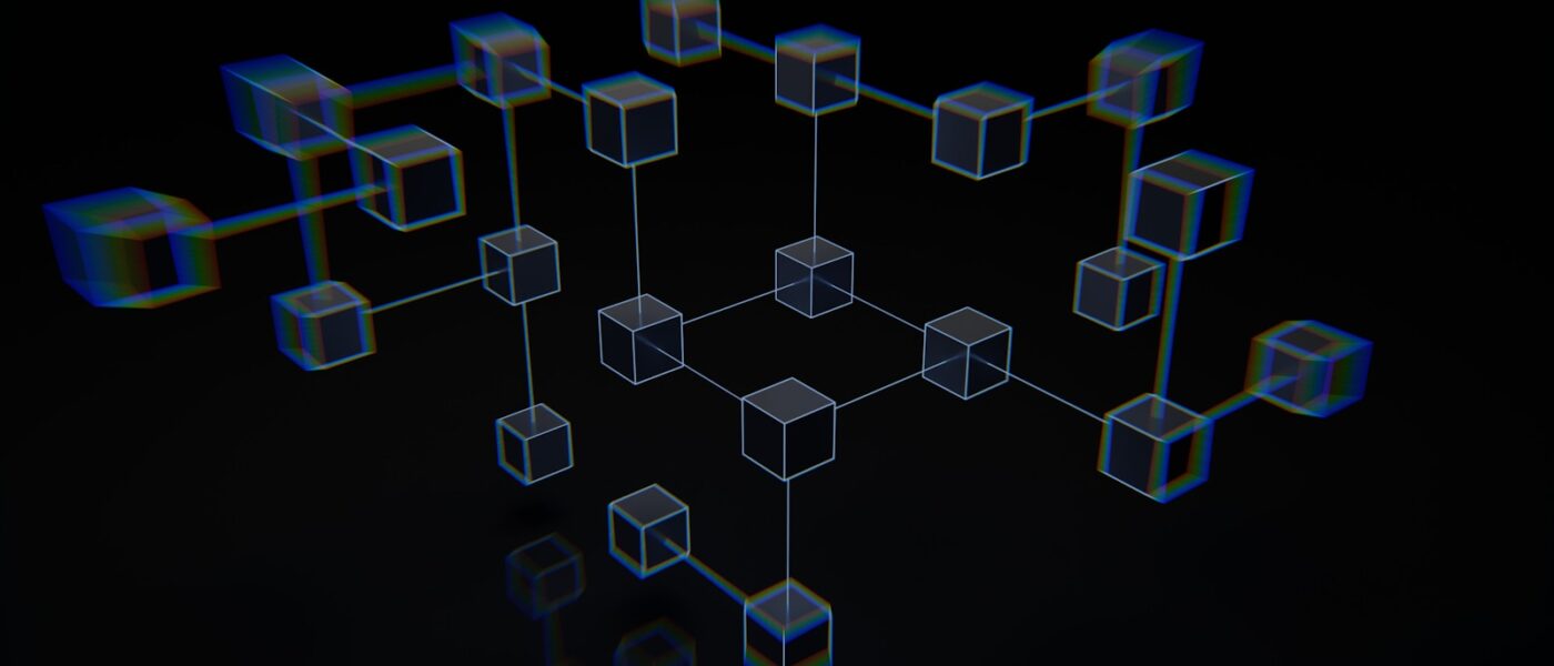 a group of cubes that are on a black surface