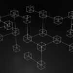 Portfele sprzętowe – najbezpieczniejszy sposób na przechowywanie crypto a black and white photo of a bunch of cubes