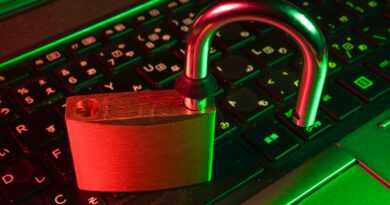 red padlock on black computer keyboard