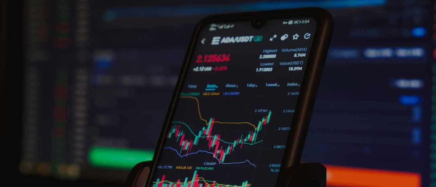 black android smartphone on brown wooden table