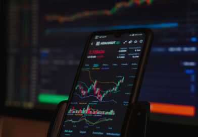 black android smartphone on brown wooden table