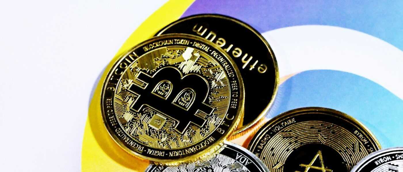 a pile of bitcoins sitting on top of each other