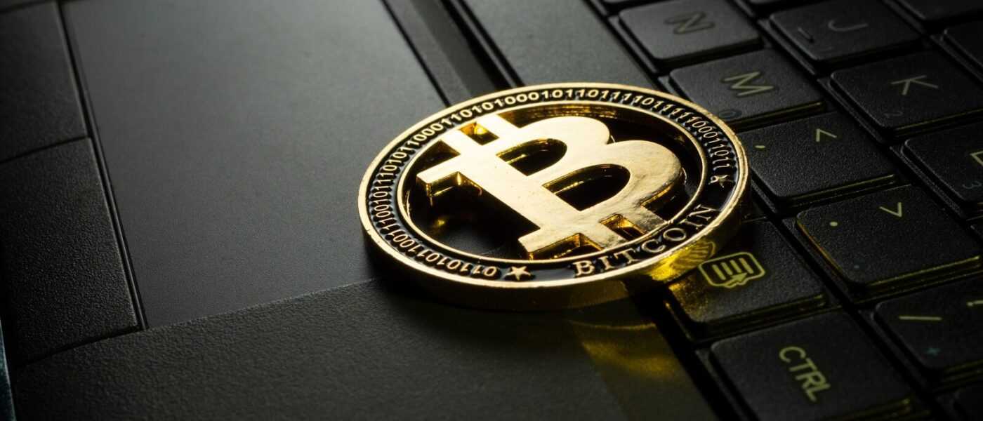 silver and black round emblem